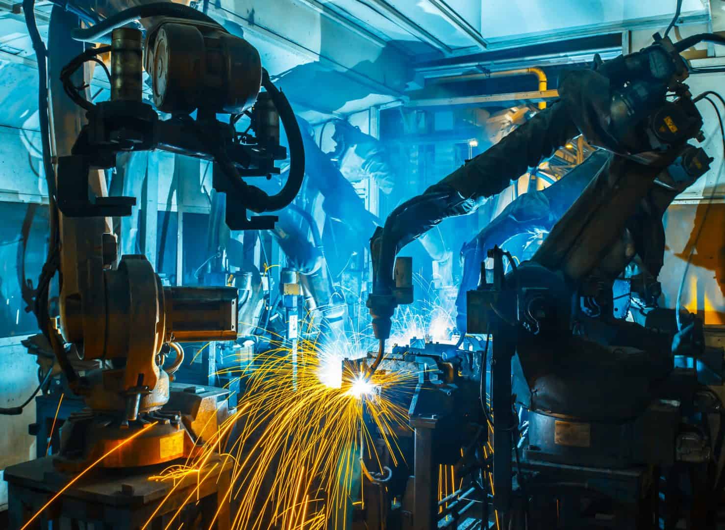 Team Welding Robot Movement Industrial Automotive Part In Factory