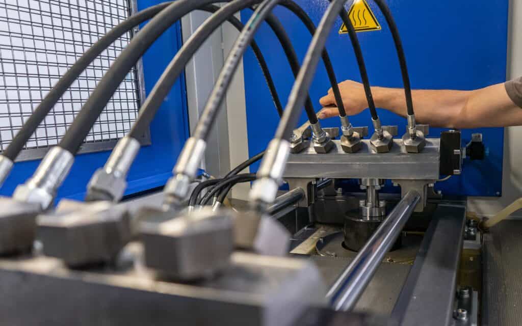 A,man's,hand,turns,on,a,set,with,for,testing